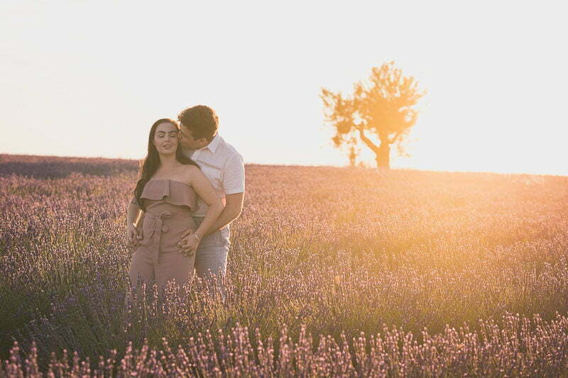 Couple kissing in the lavender fields after their proposal near valensole