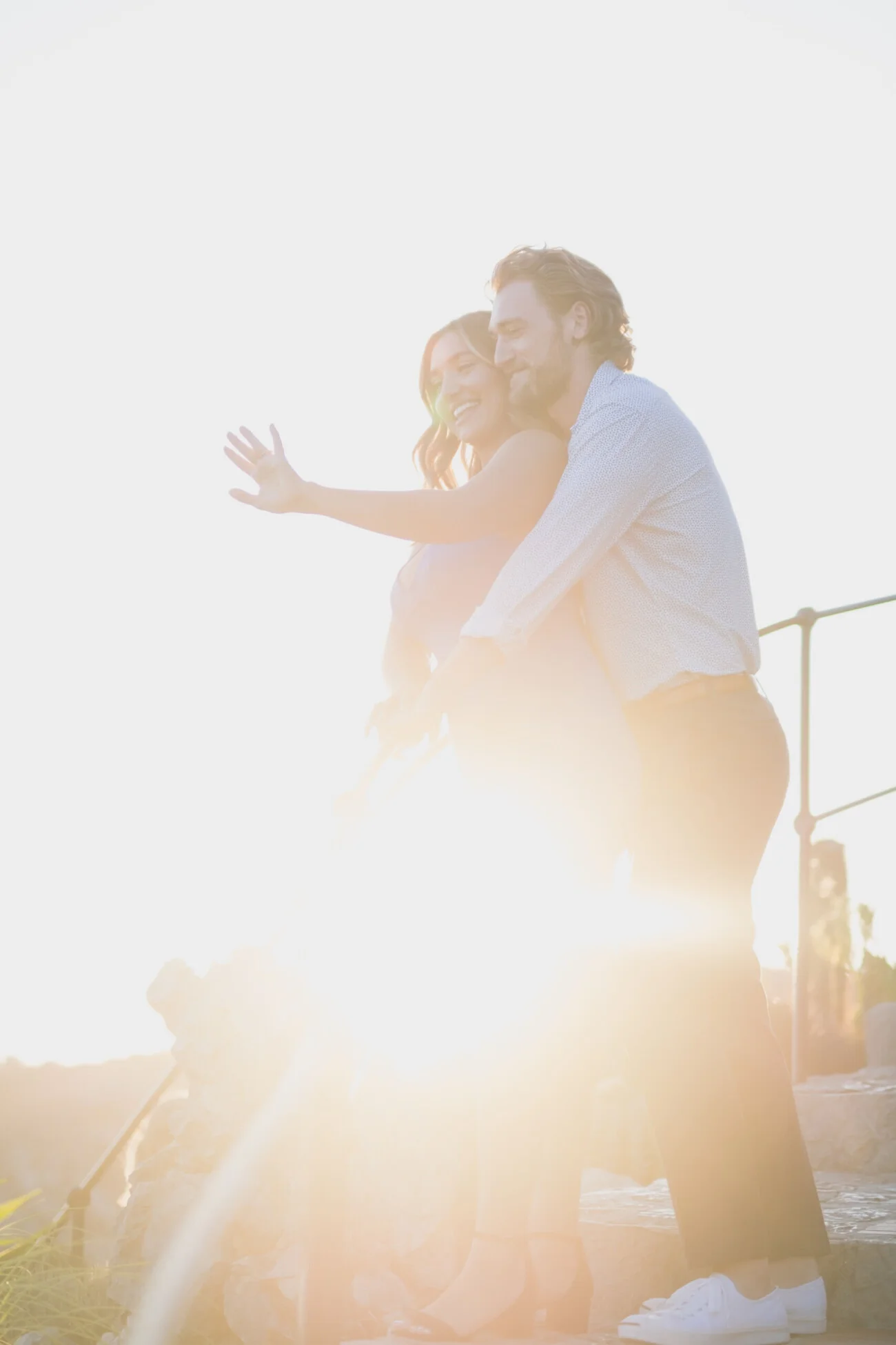 Couple at Sunset enlacing in Eze exotic garden after their French Riviera proposal 