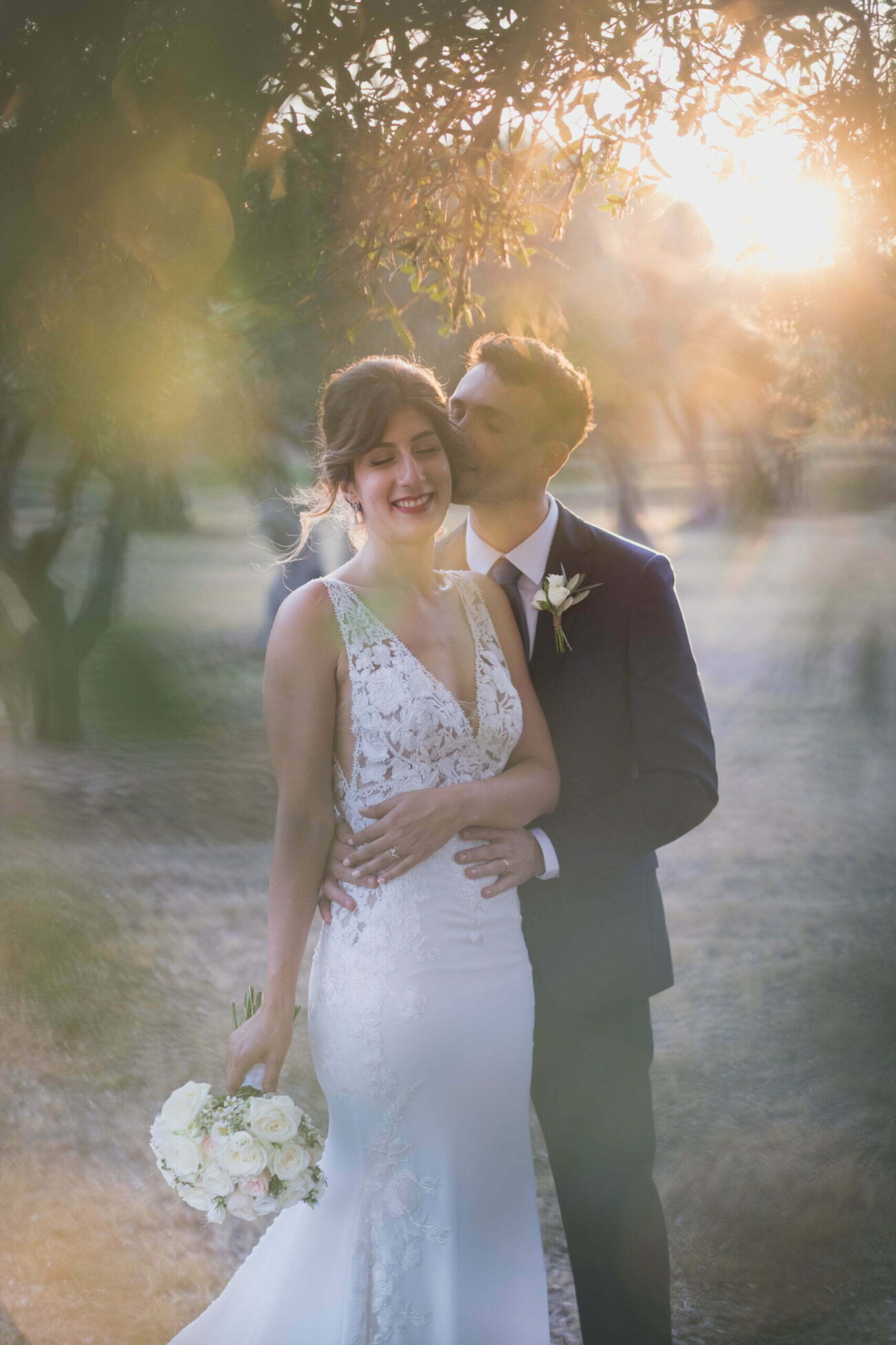 French Riviera Photographer documenting Couple tender kiss during their romantic elopement wedding in Provence