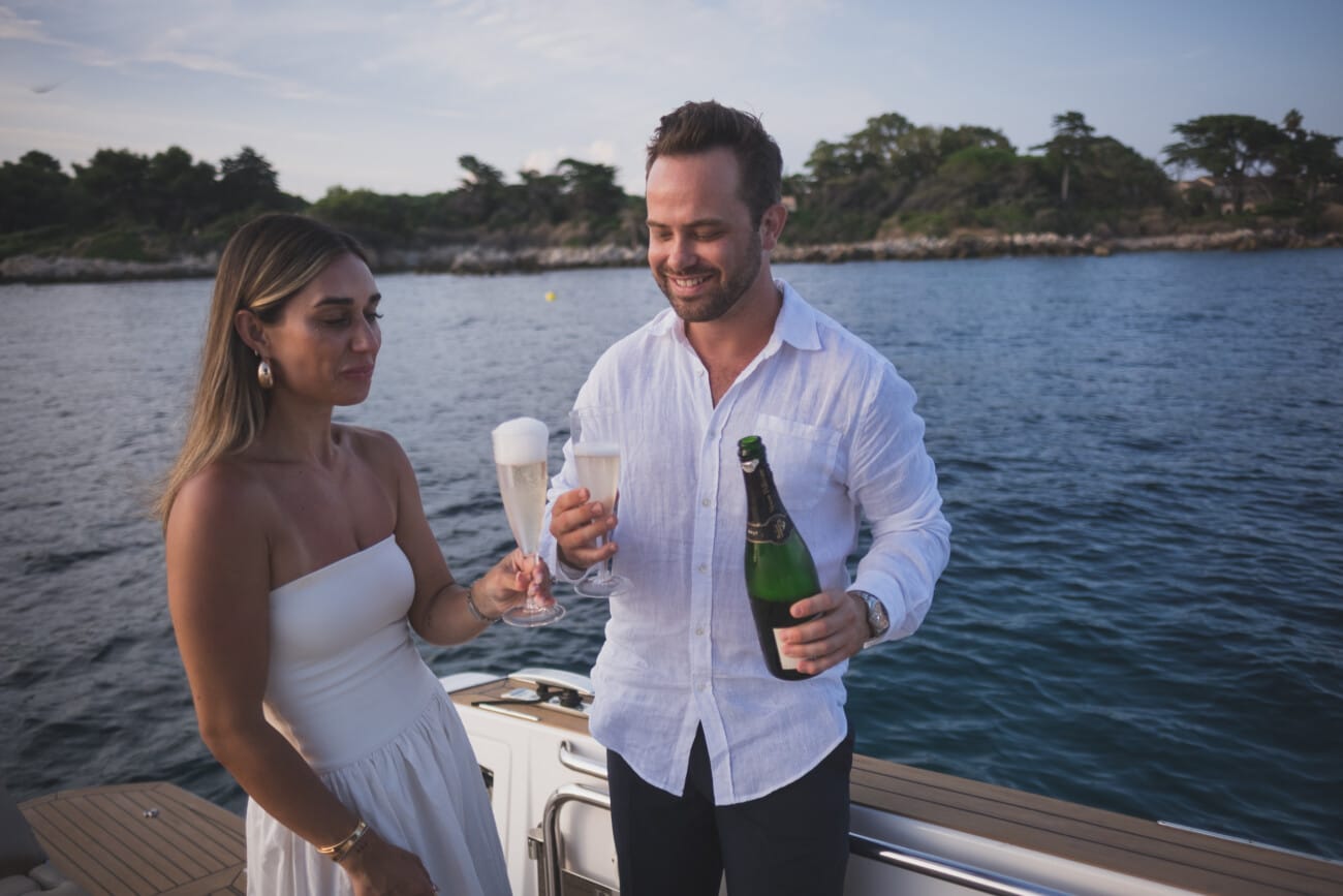 Cannes Yacht Proposal Celebration at sunset in between Lérins Island.
French Riviera proposal Photographer and French Riviera proposal Planner WildRoses