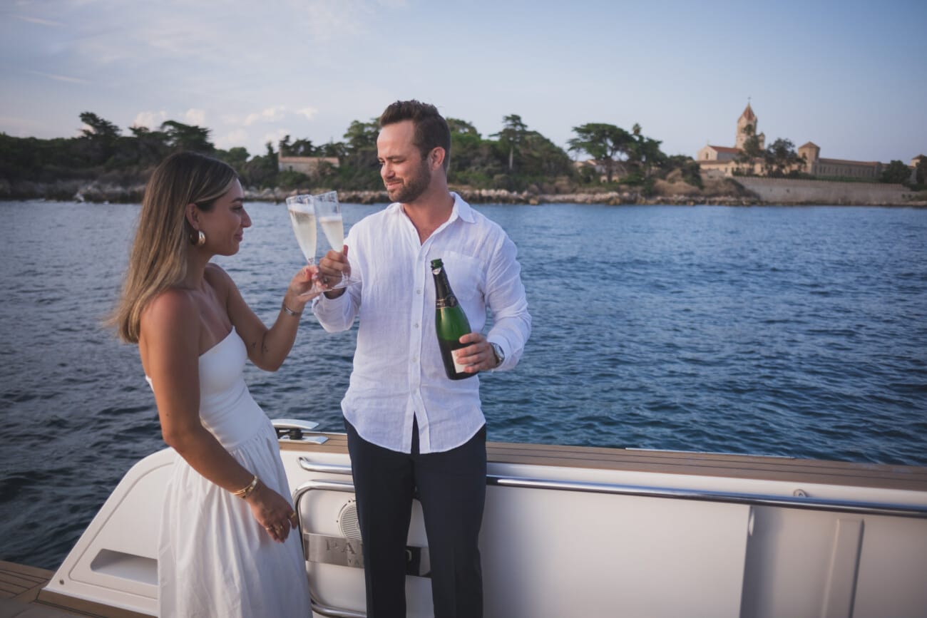 Cannes Yacht Proposal Celebration at sunset in between Lérins Island.
French Riviera proposal Photographer and French Riviera proposal Planner WildRoses