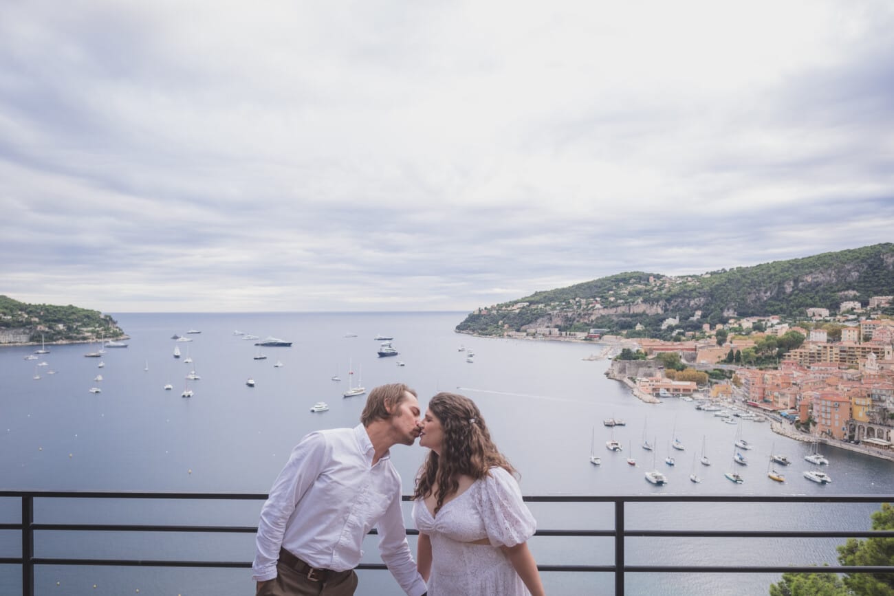 Villefranche-sur-Mer colourful intimate seaside Elopement on the French Riviera seaside - bride and groom kissing