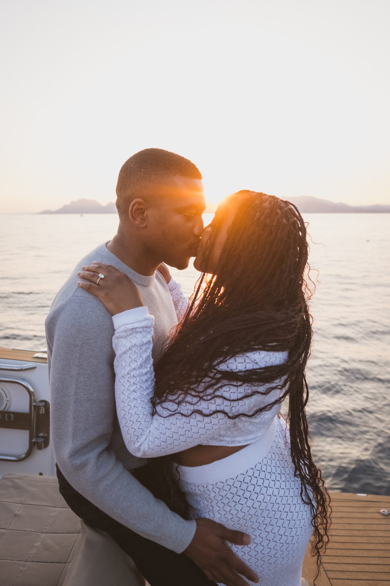 A Romantic Proposal on a Yacht between the Lérins Islands 24 Couple kissing on a yacht, after an intimate French Riviera Yacht proposal near Cannes.
Planning and Photography by WildRoses Studio.