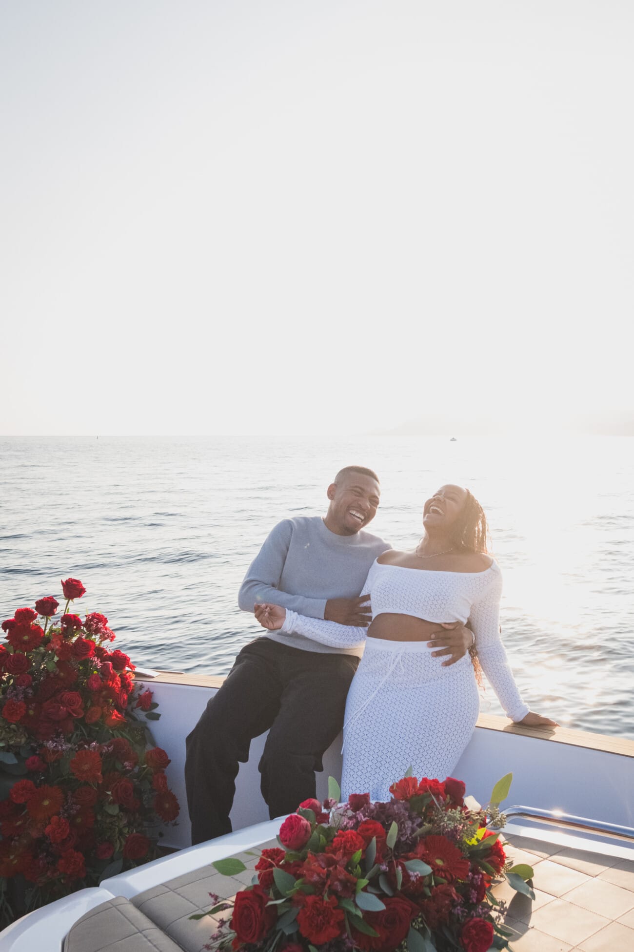 A Romantic Proposal on a Yacht between the Lérins Islands 12 Pure joy and laughter after getting engaged on a yacht on the French Riviera.
Proposal planning and Photography WildRoses Studio