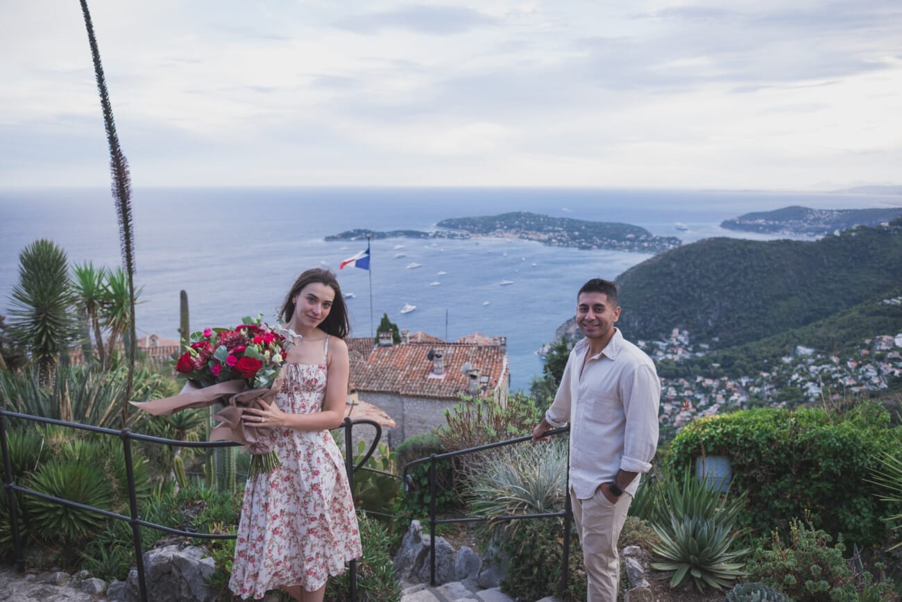 Couple standing among the succulents and plants in the Eze Exotic Garden during their photo session