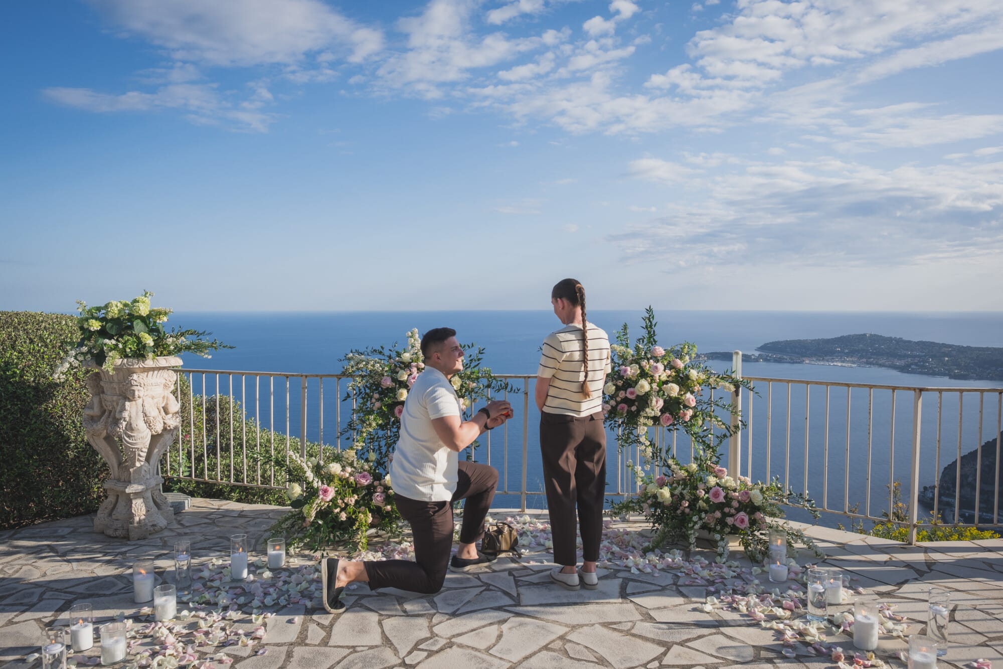 Eze Chateau Chevre d'or Proposal on one knee with floral decoration aroundProposal Planning & photography WildRoses
